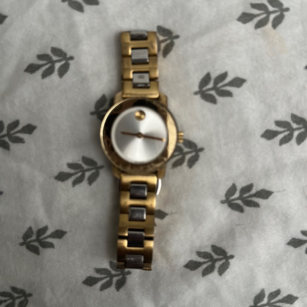 Gold movado bold